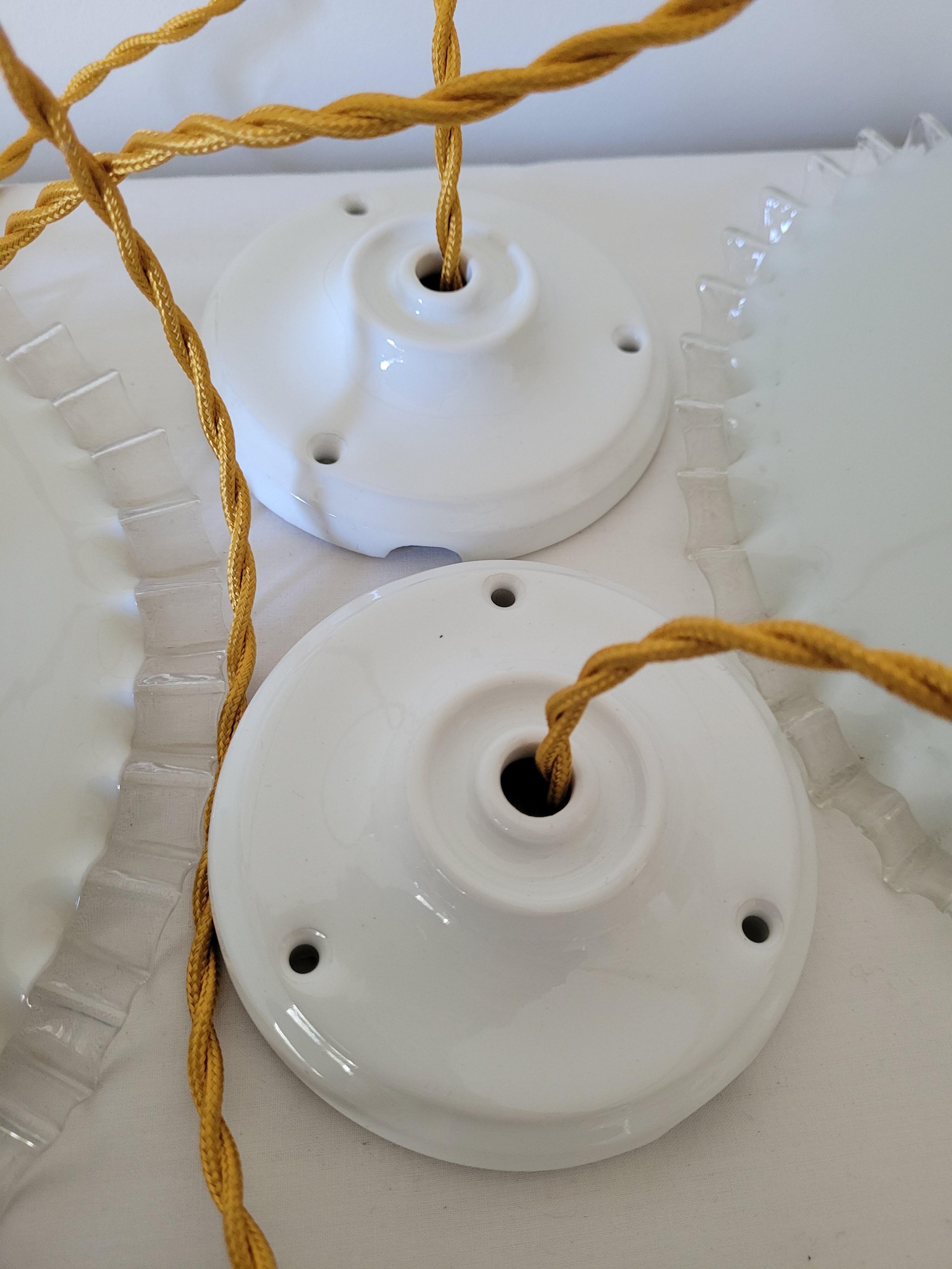 Duo of serrated opaline suspensions