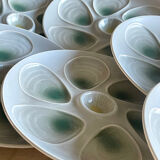 11 oyster plates 1960.