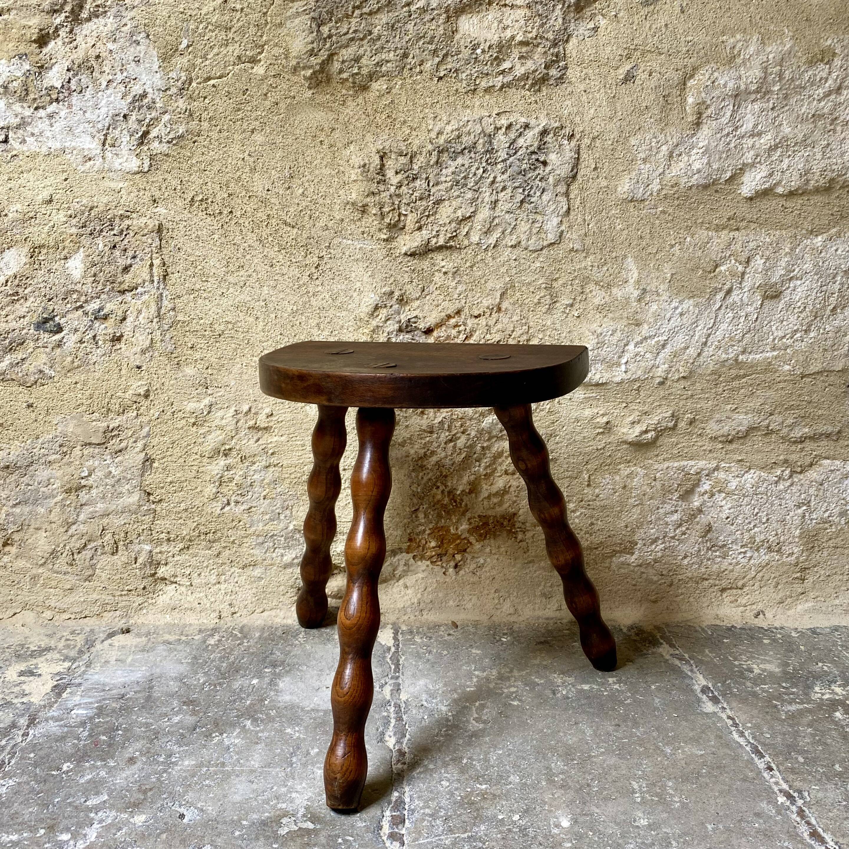 Turned wooden tripod stool
