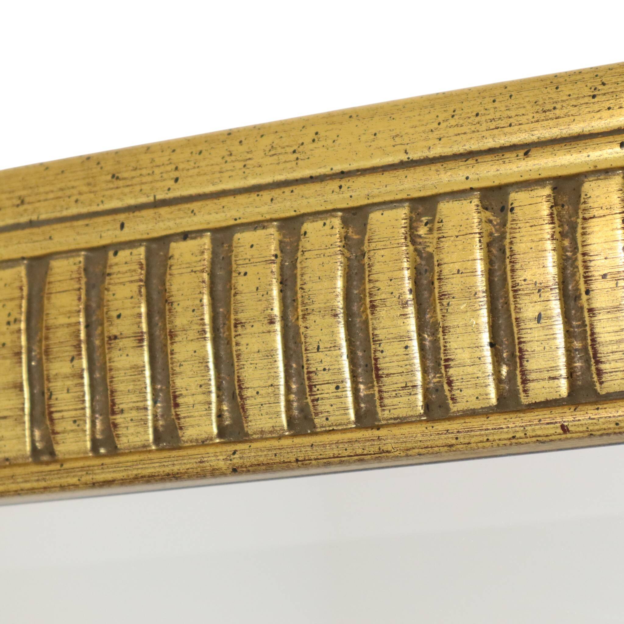 Miroir Deknudt en or Hollywood Regency biseauté 92 cm
