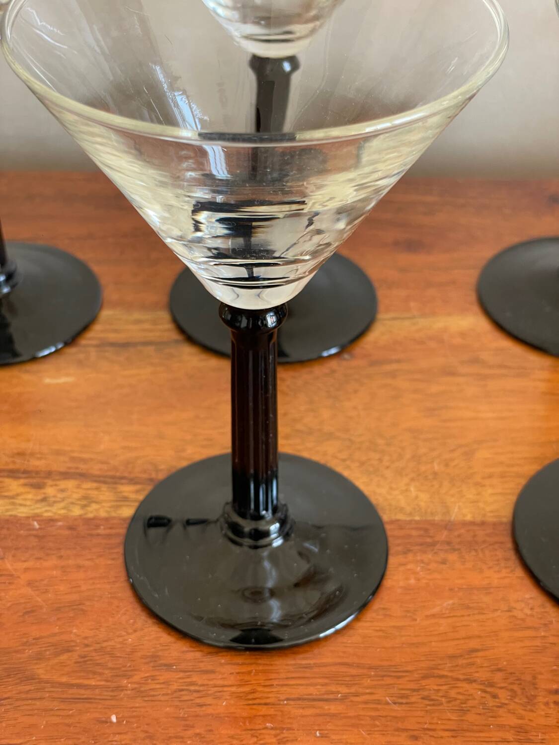 6 black stemmed glasses