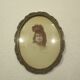 Old wall frame in carved wood and gilded stucco, oval