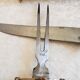 Vintage cutting service with knife and fork in wooden sheath