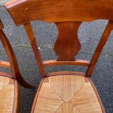 4 Landais chairs with solid oak cross frames, straw seats.