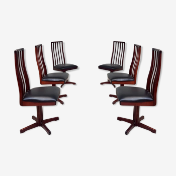 Set of six mahogany swivel dining chairs by Mcintosh