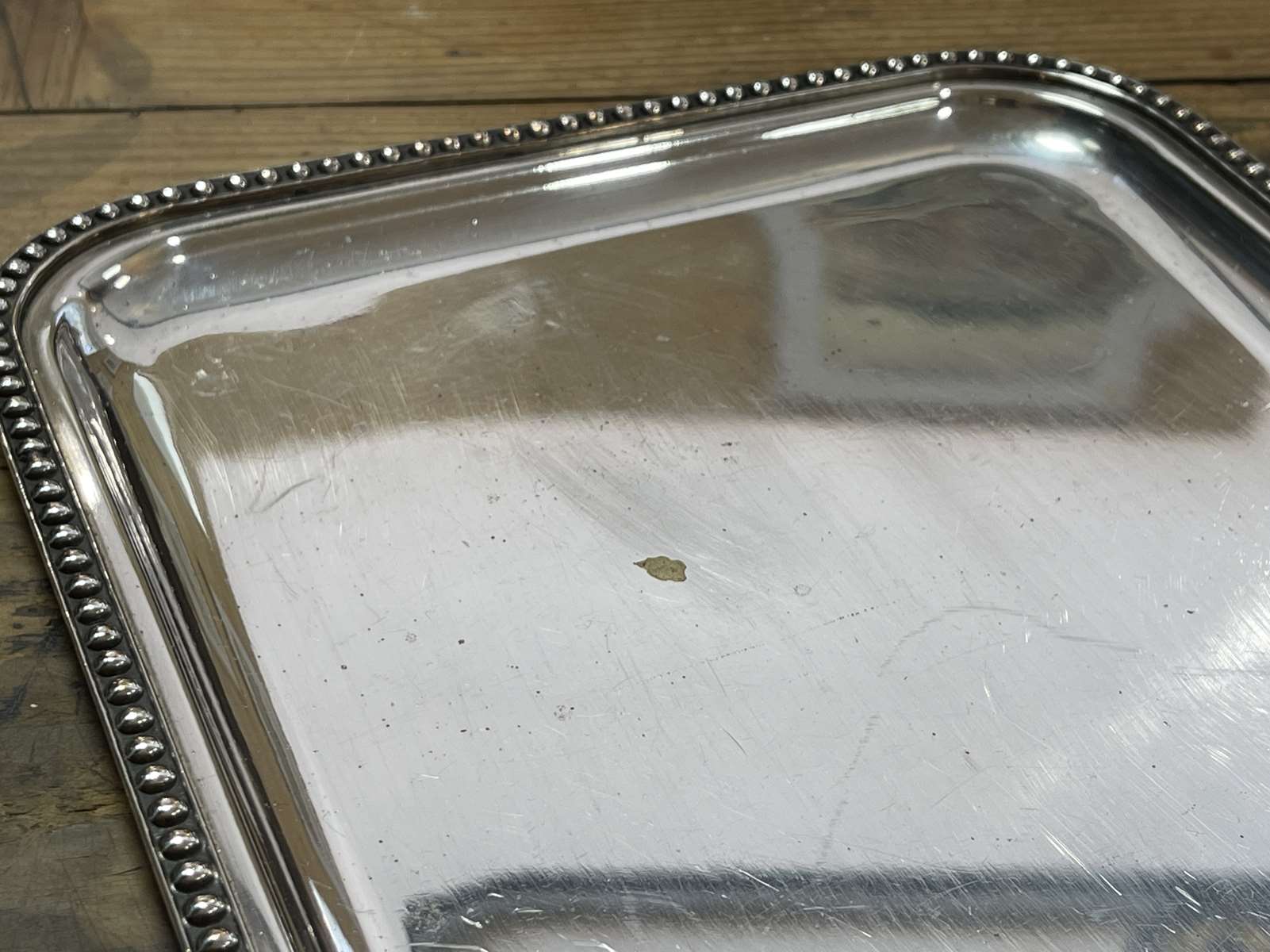 Small rectangular and beaded silver metal top