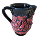 Vintage pitcher in midnight blue glazed ceramic with bright pink relief
