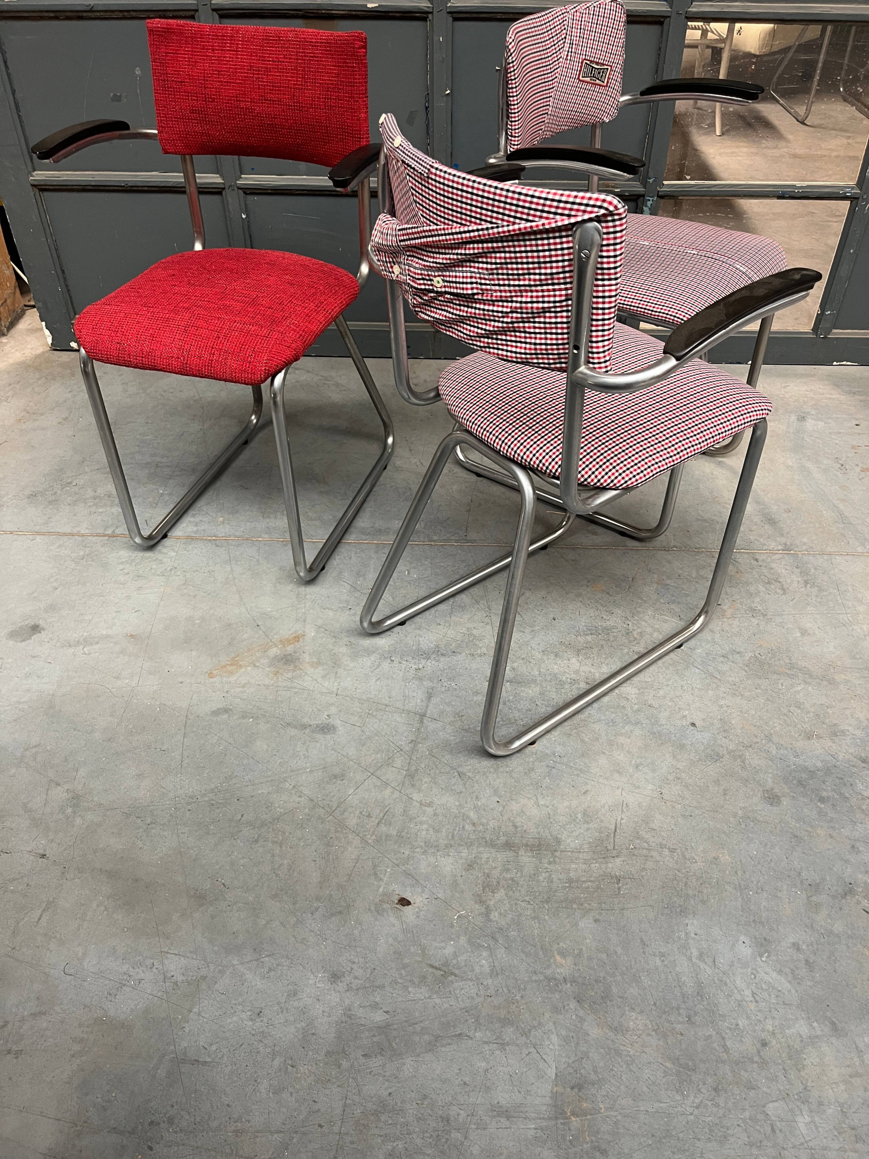 Set of 3 vintage cantilever chairs reupholstered.