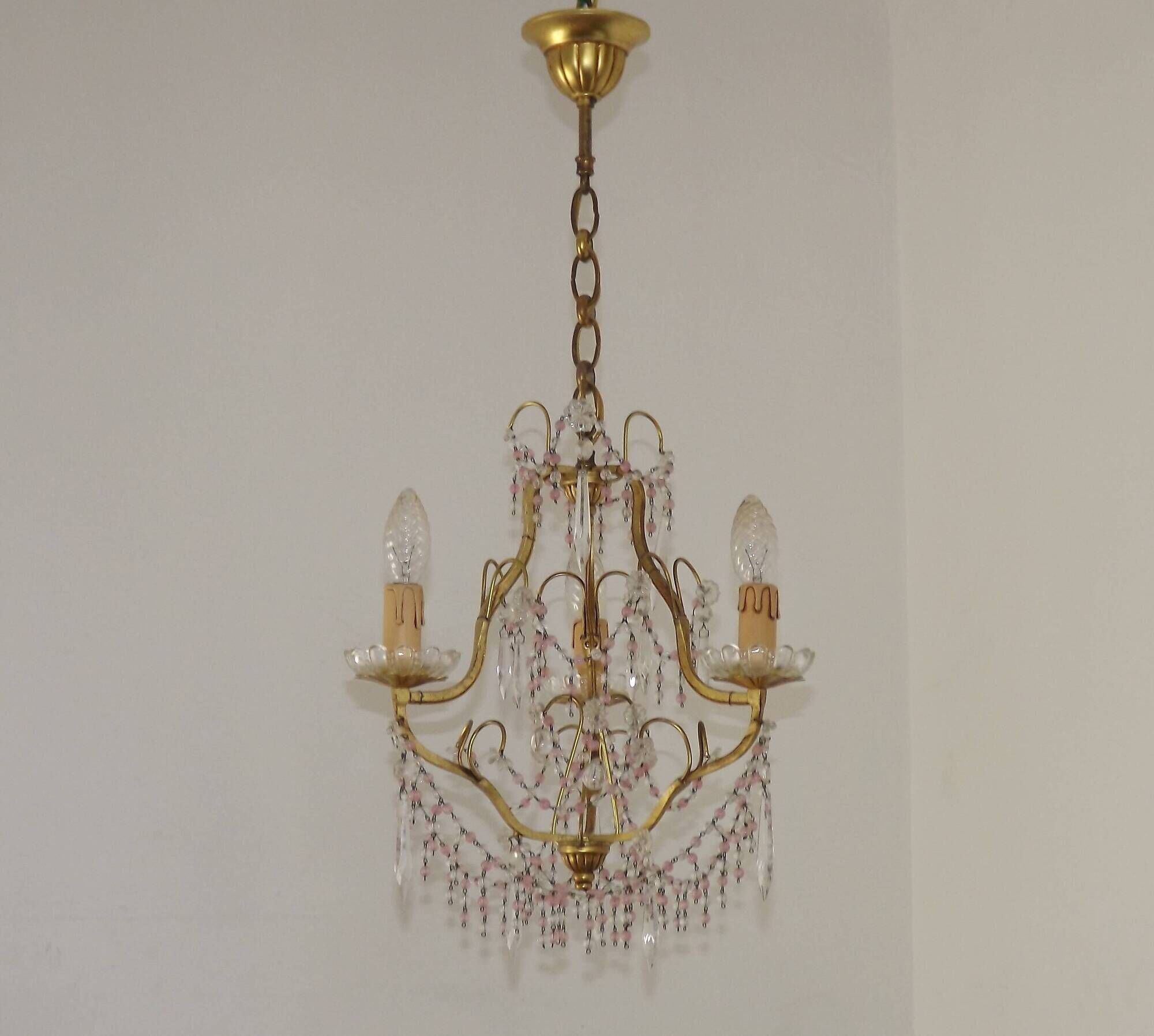 French gilt bronze three-light cage chandelier with pink and clear beaded swags.