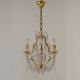 French gilt bronze three-light cage chandelier with pink and clear beaded swags.