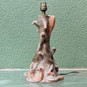 Lamp base in sculpted terracotta featuring birds, signed.