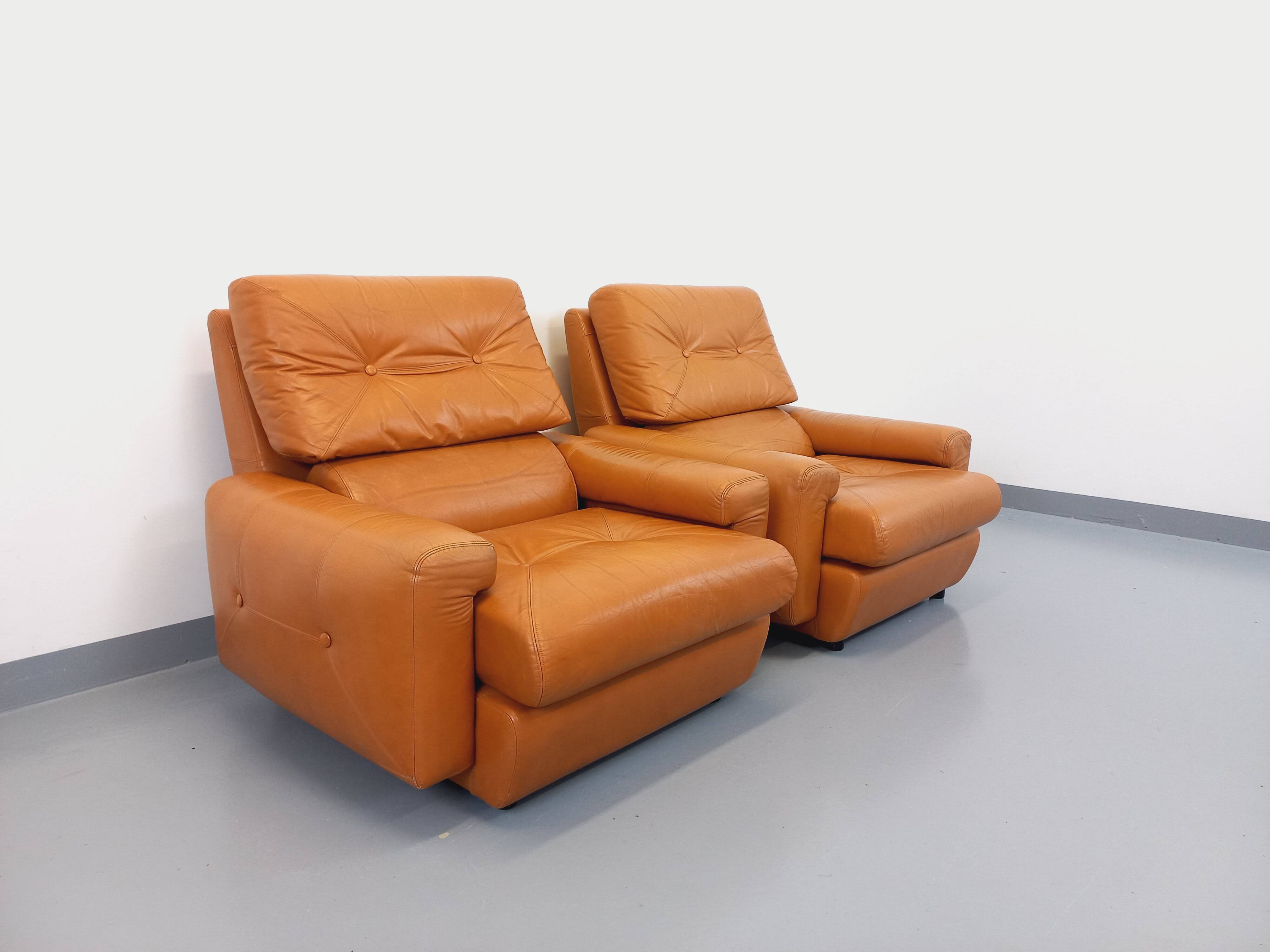 Pair of vintage leather lounge chairs from the 60s and 70s