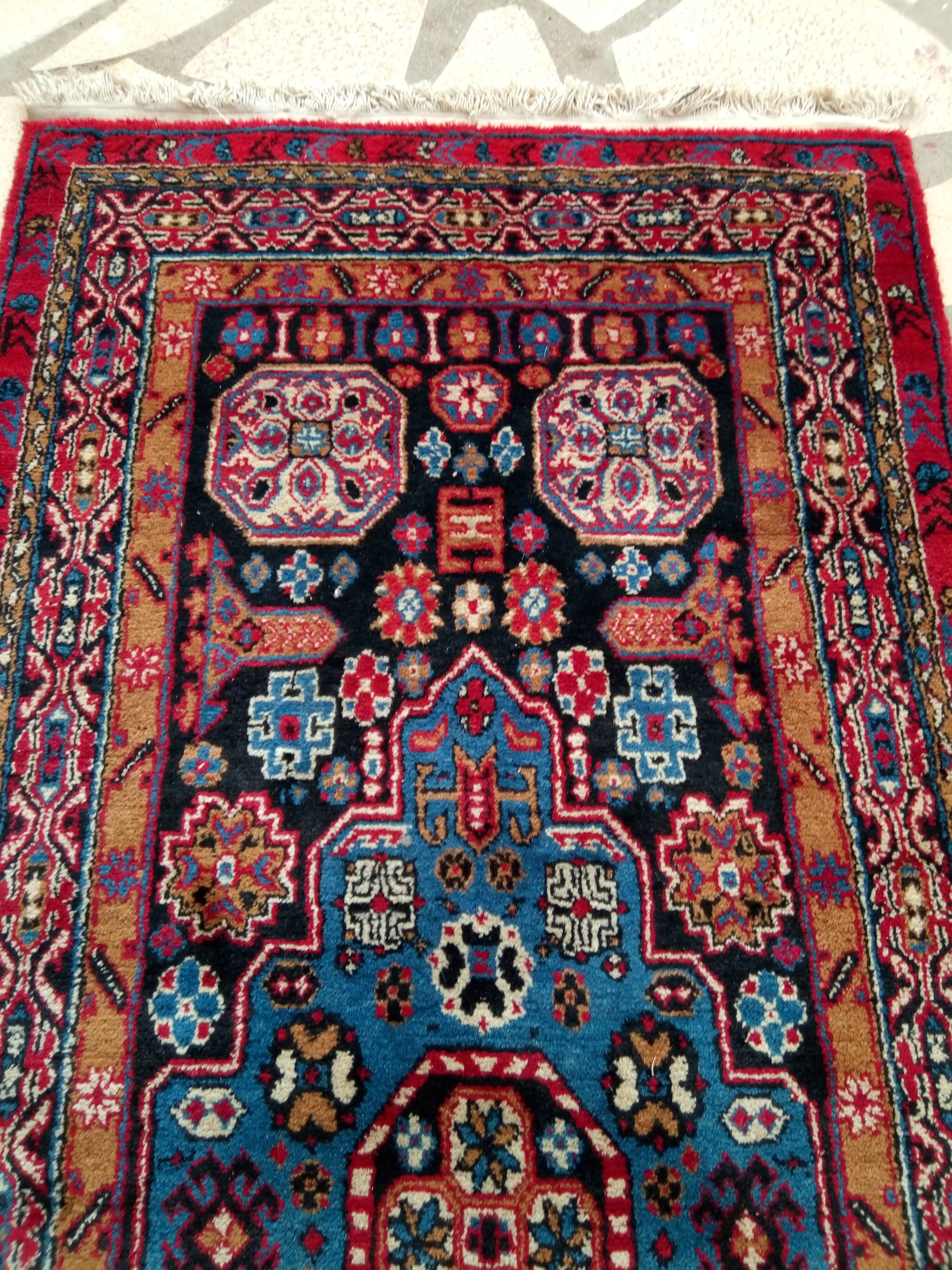 Old oriental rug made hands. 181 x 90cm