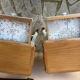 Renovated bedside tables in laurel green and light wood.