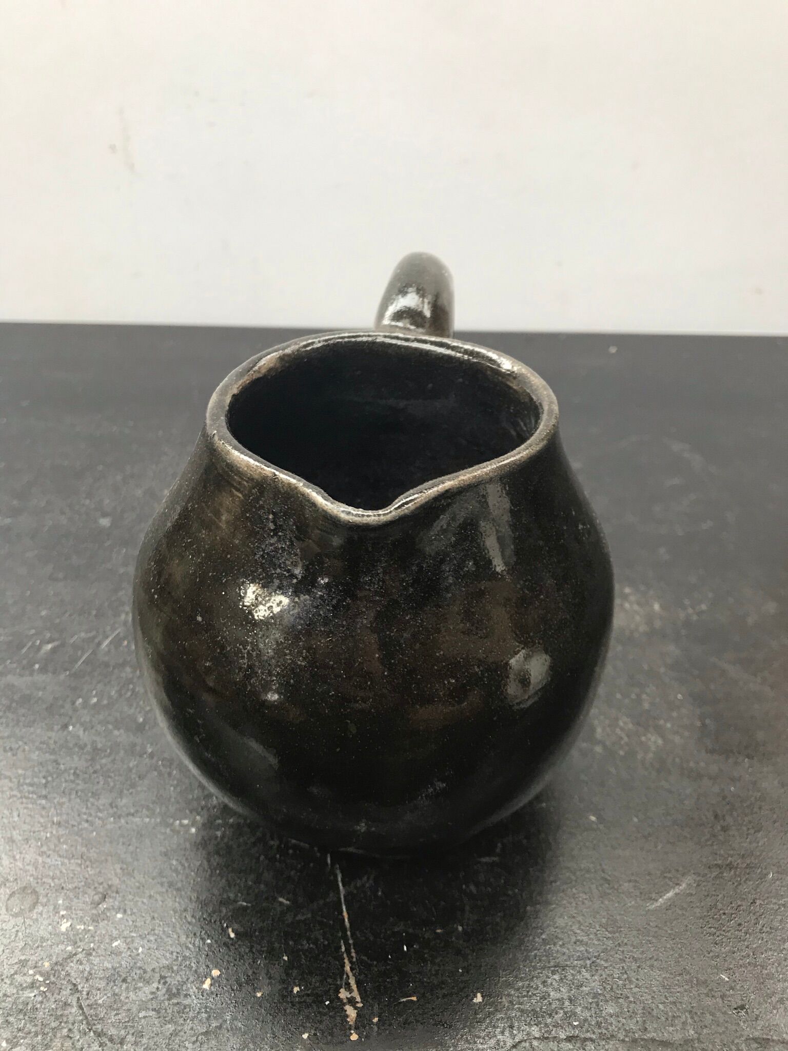 Former black ceramics pitcher 70