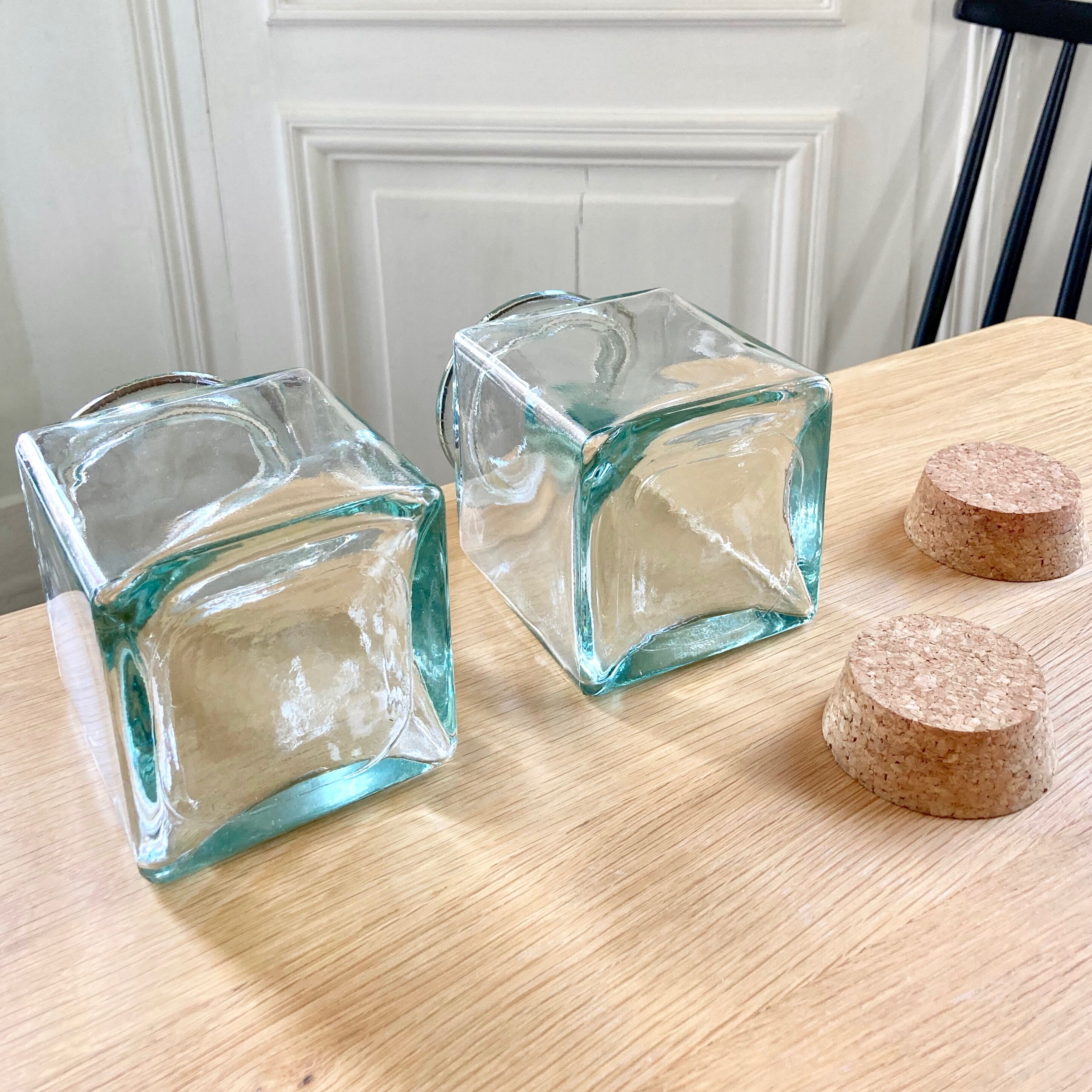 Pair of square jars in tinted glass and corks