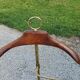 Valet de chambre of the 50s in gilded brass and wood
