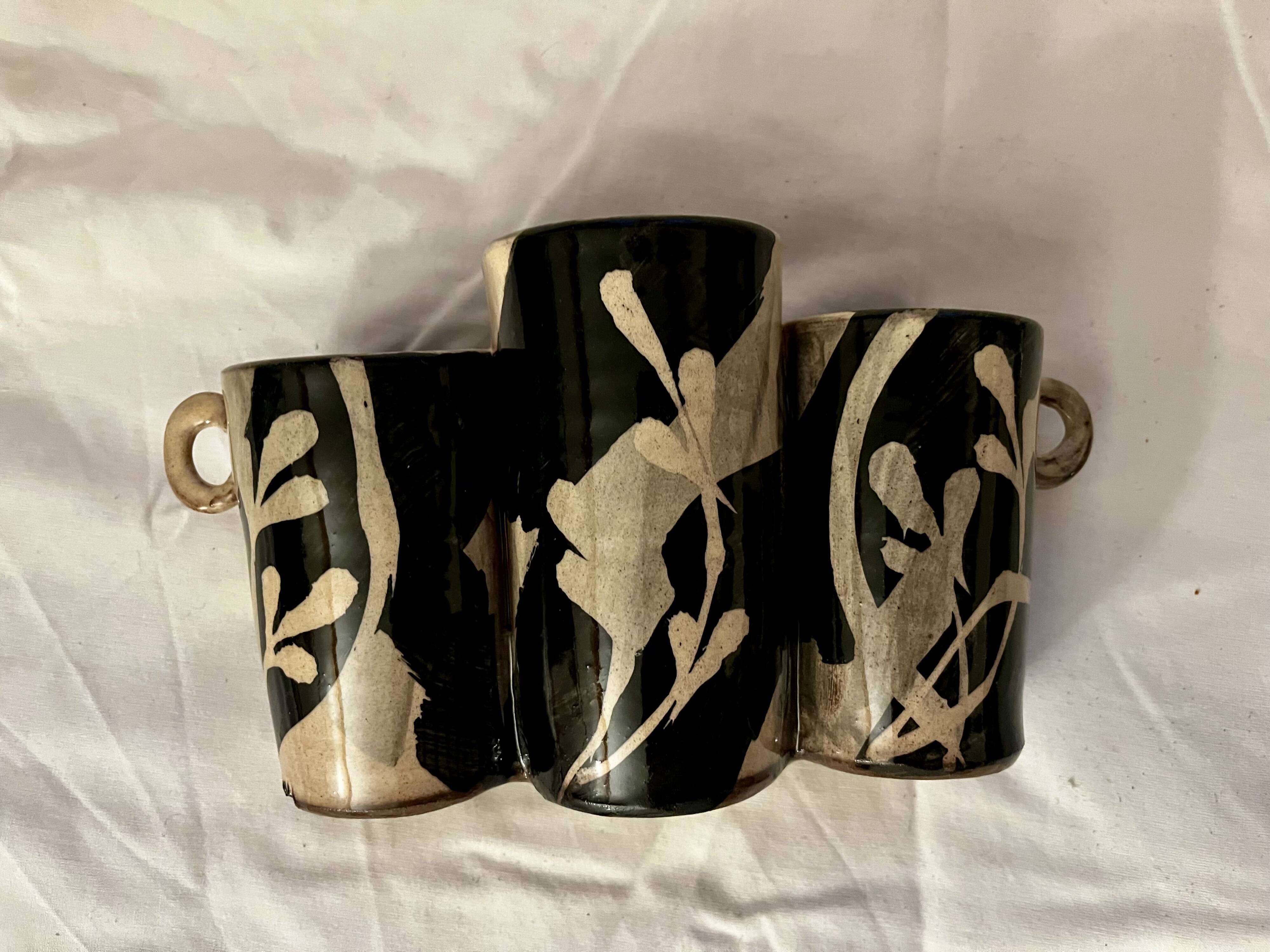 Small triple ceramic vase