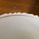Porcelain cup with chiseled and gilded rim