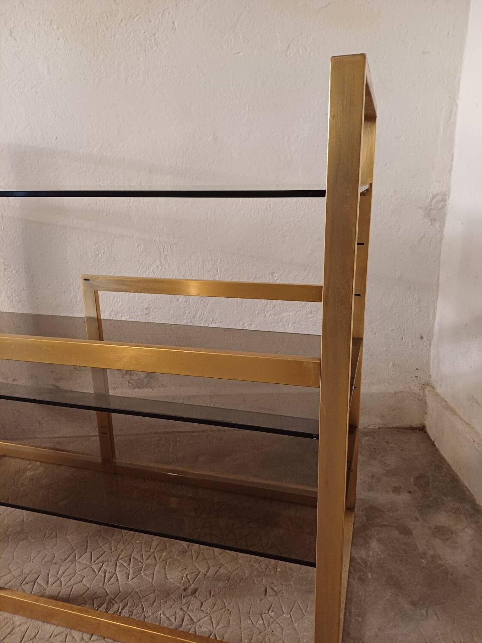 Brass shelf, smoked glass