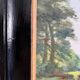 Oil on panel 20th century watercourse trees in bloom blackened wooden frame