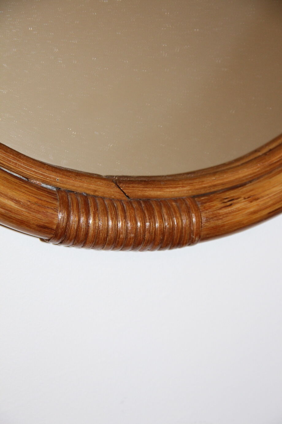 Oval bamboo mirror