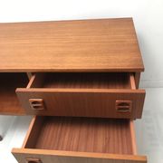 Scandinavian 60s row with spindle feet