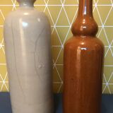 Duo of sandstone bottles