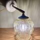 Vintage amber glass globe wall light