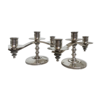 Candle holders or candlesticks made of silver metal