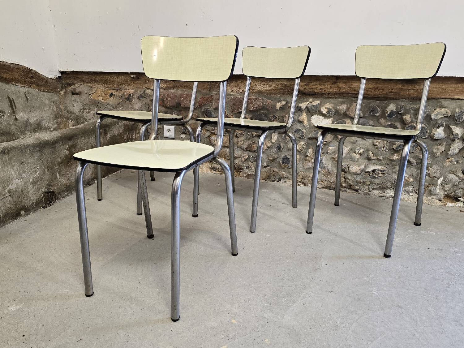Set of 4 light yellow formica chairs
