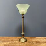 Ornate brass table lamp with mint green glass shade