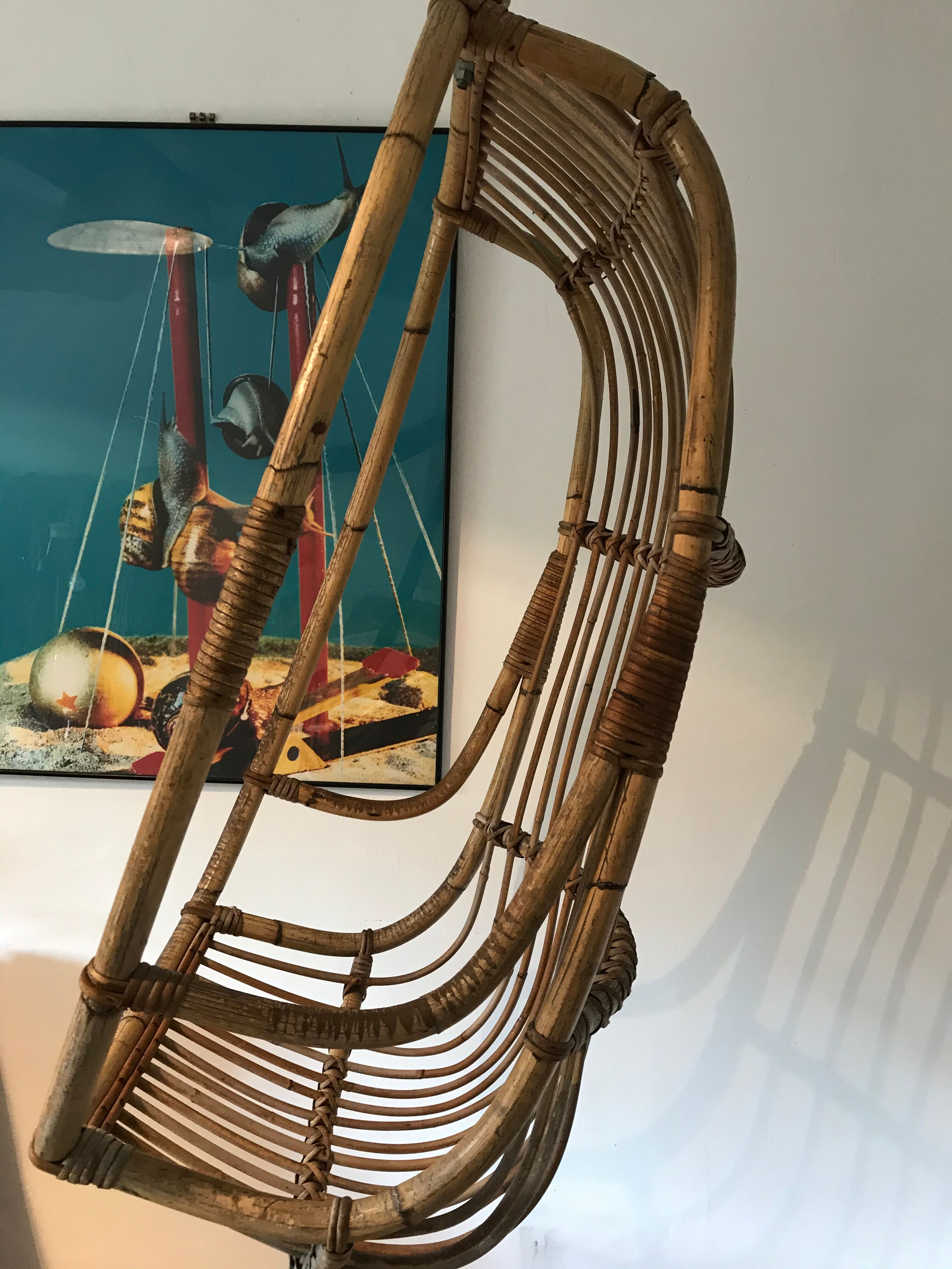 Vintage chair suspended in rattan