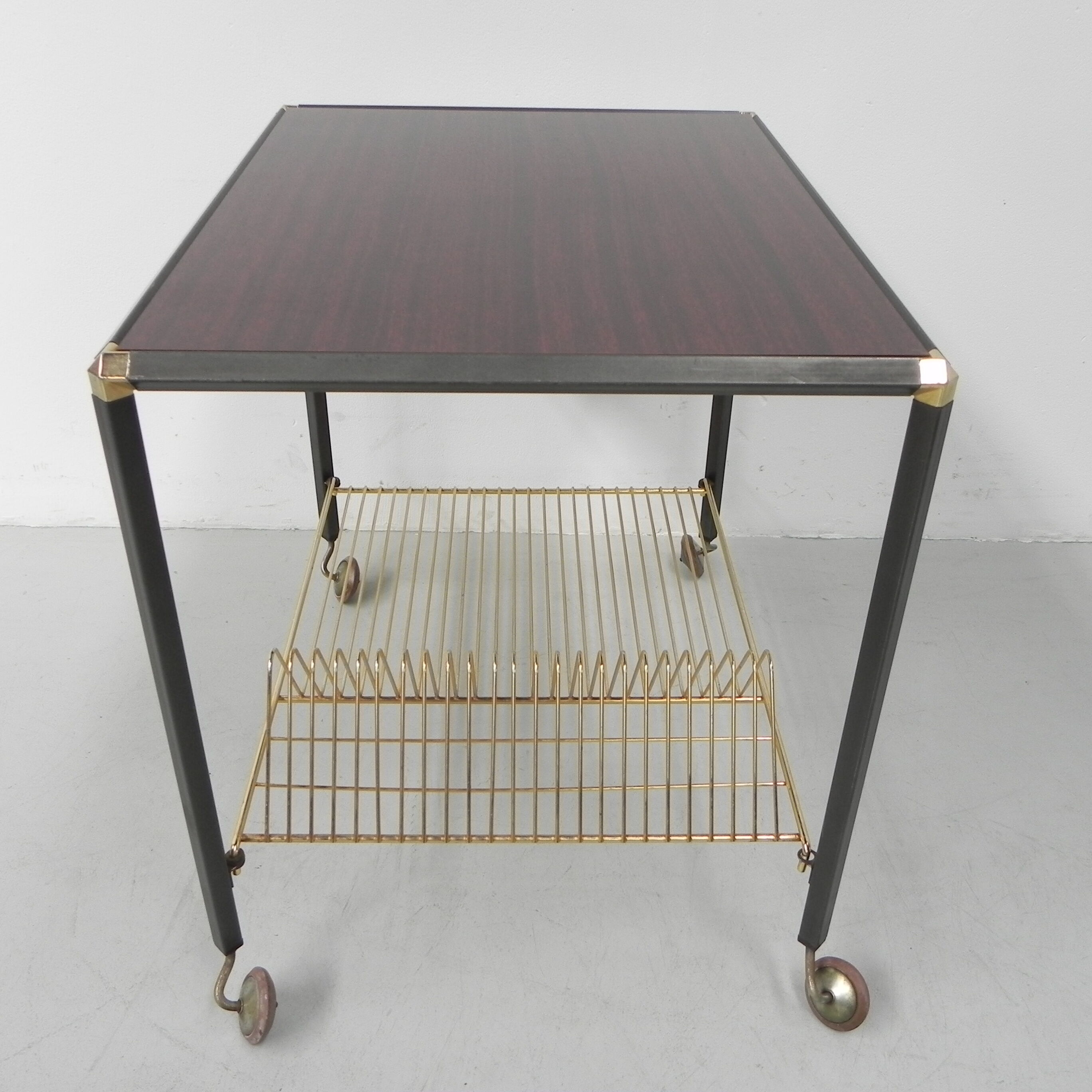 Vintage coffee table on castors with singles rack