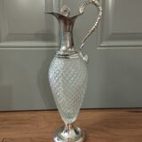 Old ewer in crystal and silver metal