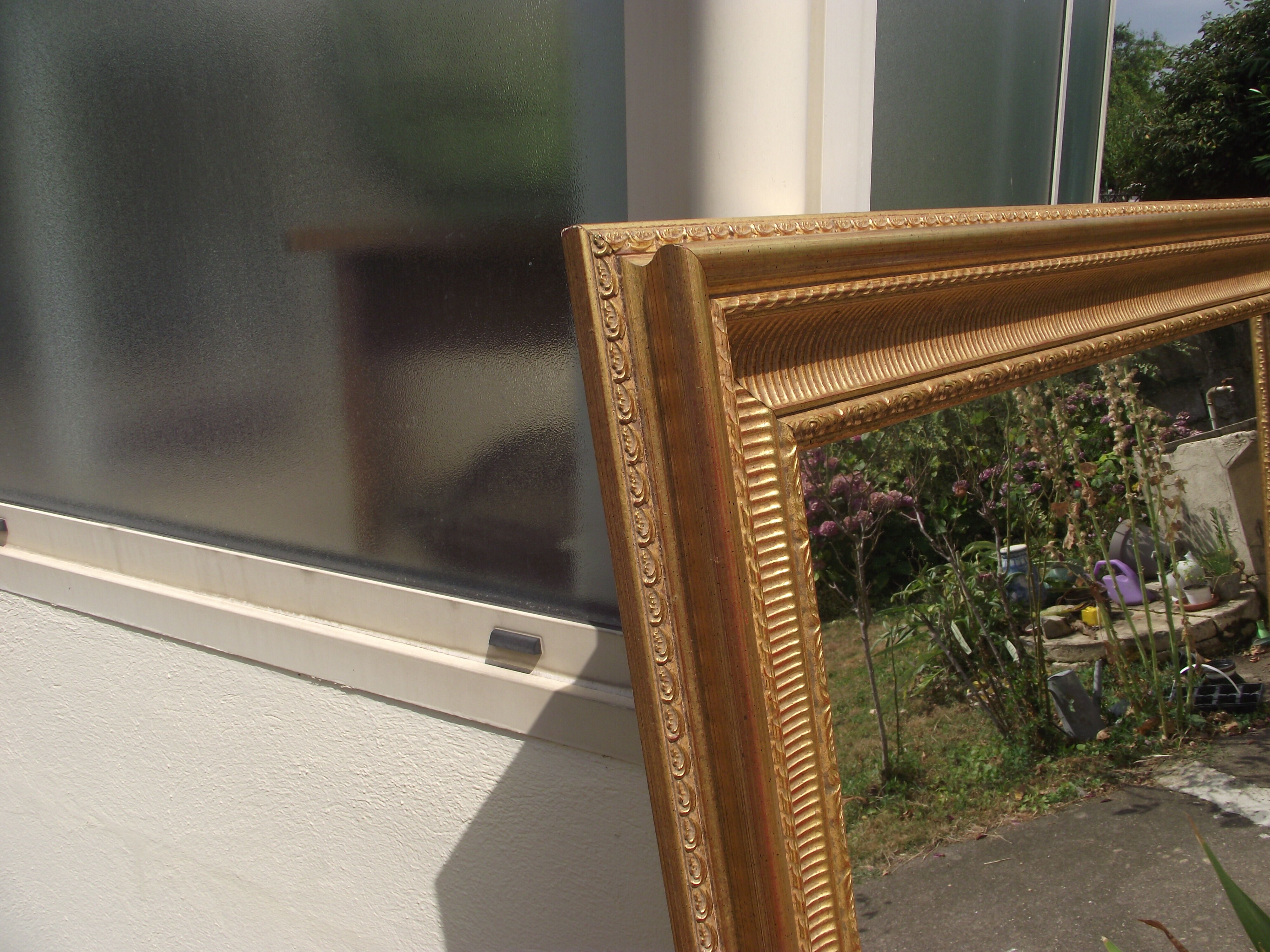 Mirror carved and gilded wood from the 80