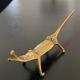 8 porte-couteaux forme antilope et crocodile en laiton