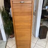 1950s oak office storage cabinet with curtains.