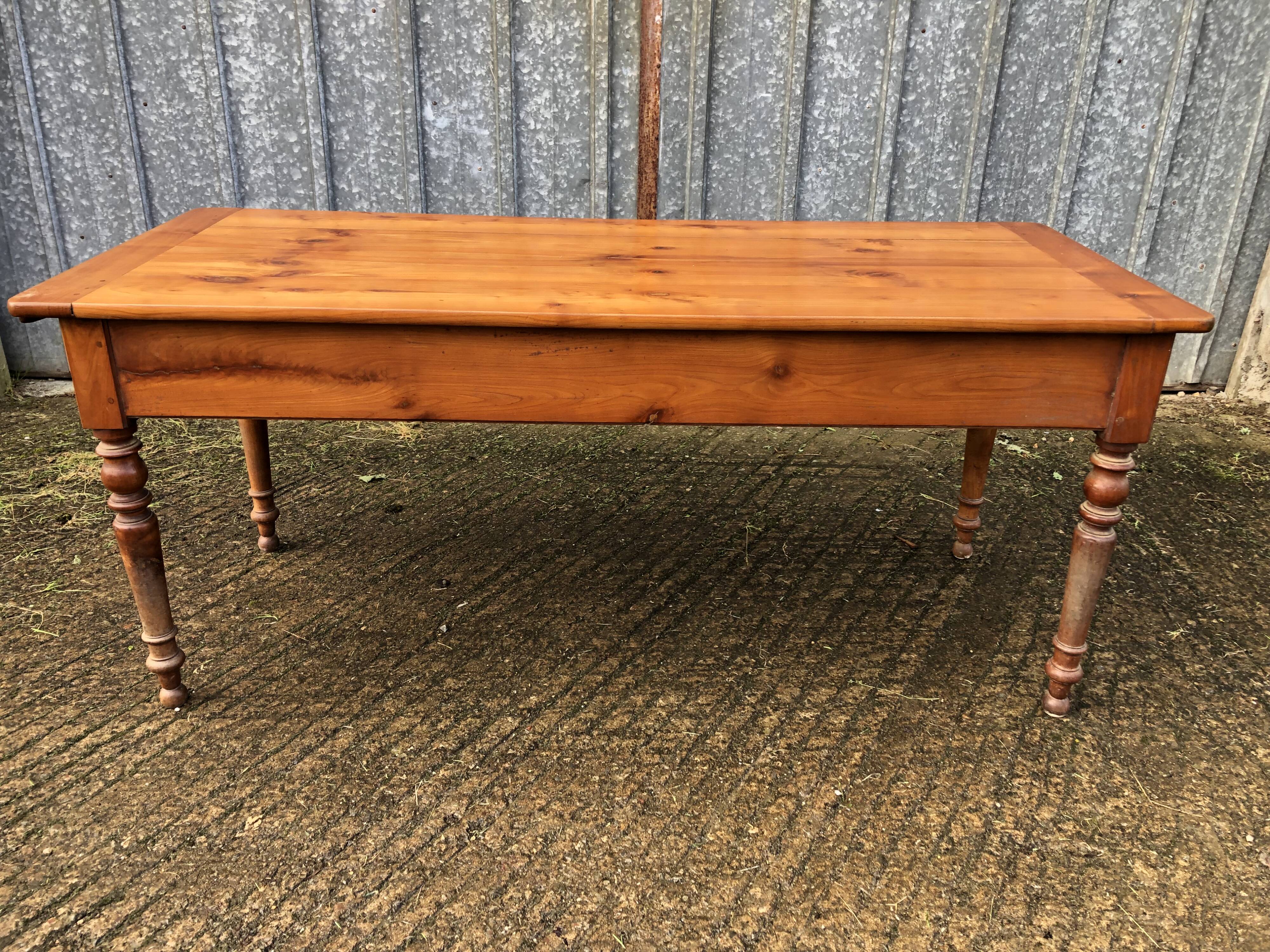 Antique farmhouse table in solid cherry wood in Louis Philippe style.