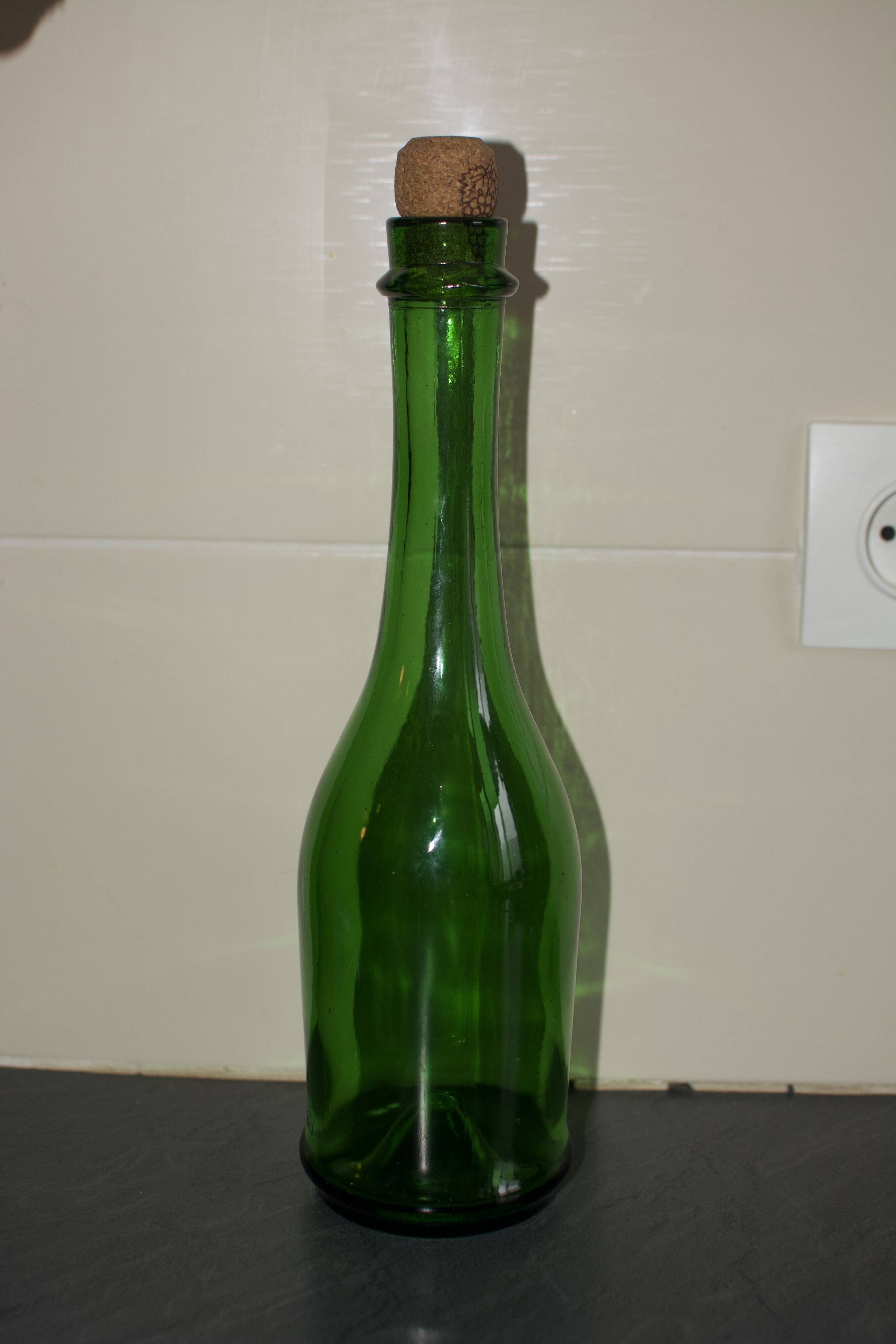 Vintage green glass bottle