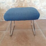 Armchair and its footrest