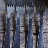 Mismatched set of 8 forks + 8 vintage shell stainless steel knives