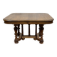 Henri II walnut table from the early 20th century with extensions.