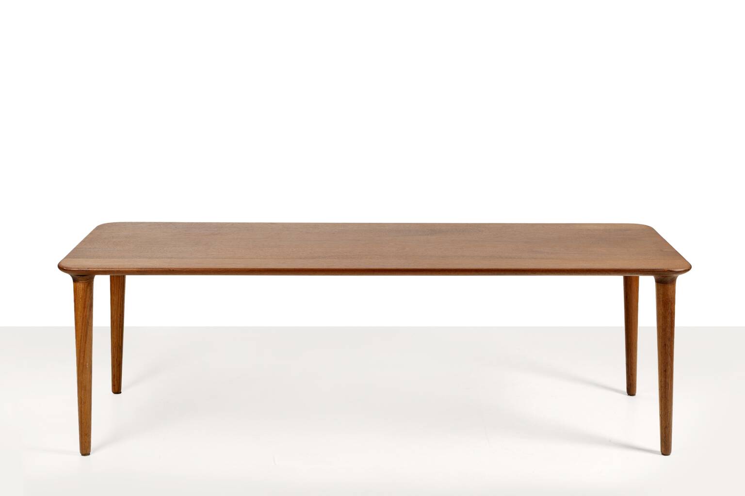 Norwegian classic solid teak coffee table. Norway, 1970s