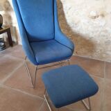 Armchair and its footrest