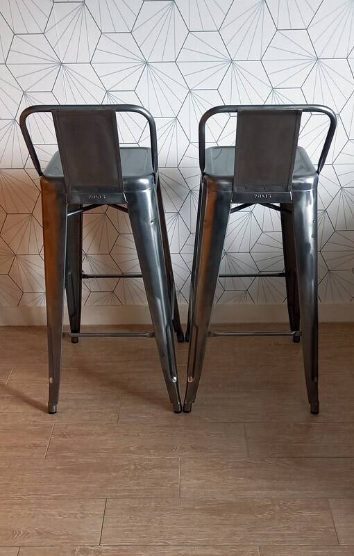 Pair of tolix hpd 75 stools – in varnished raw steel.