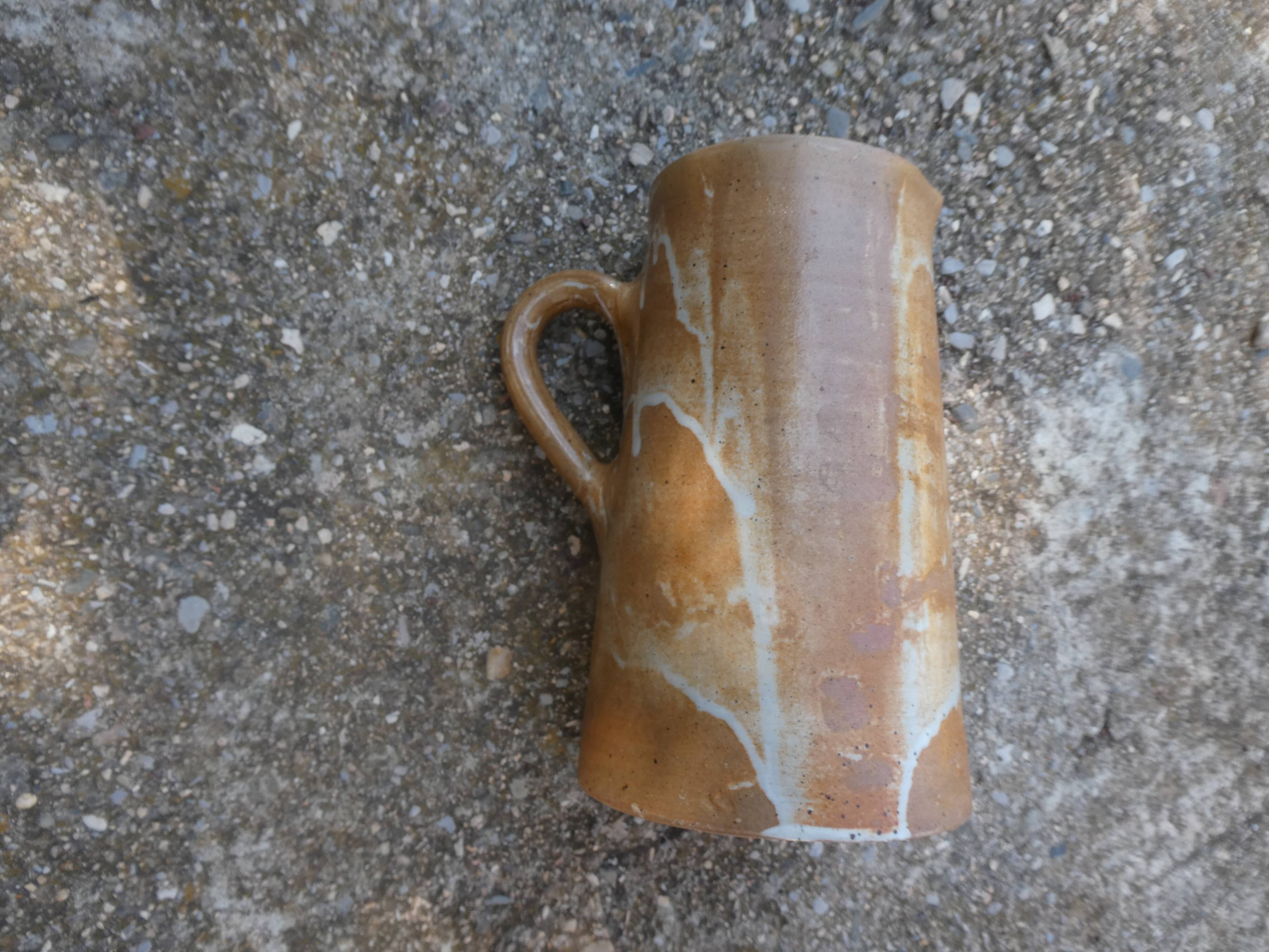Service mazagrans and decanter in enamelled stoneware.