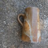 Service mazagrans and decanter in enamelled stoneware.