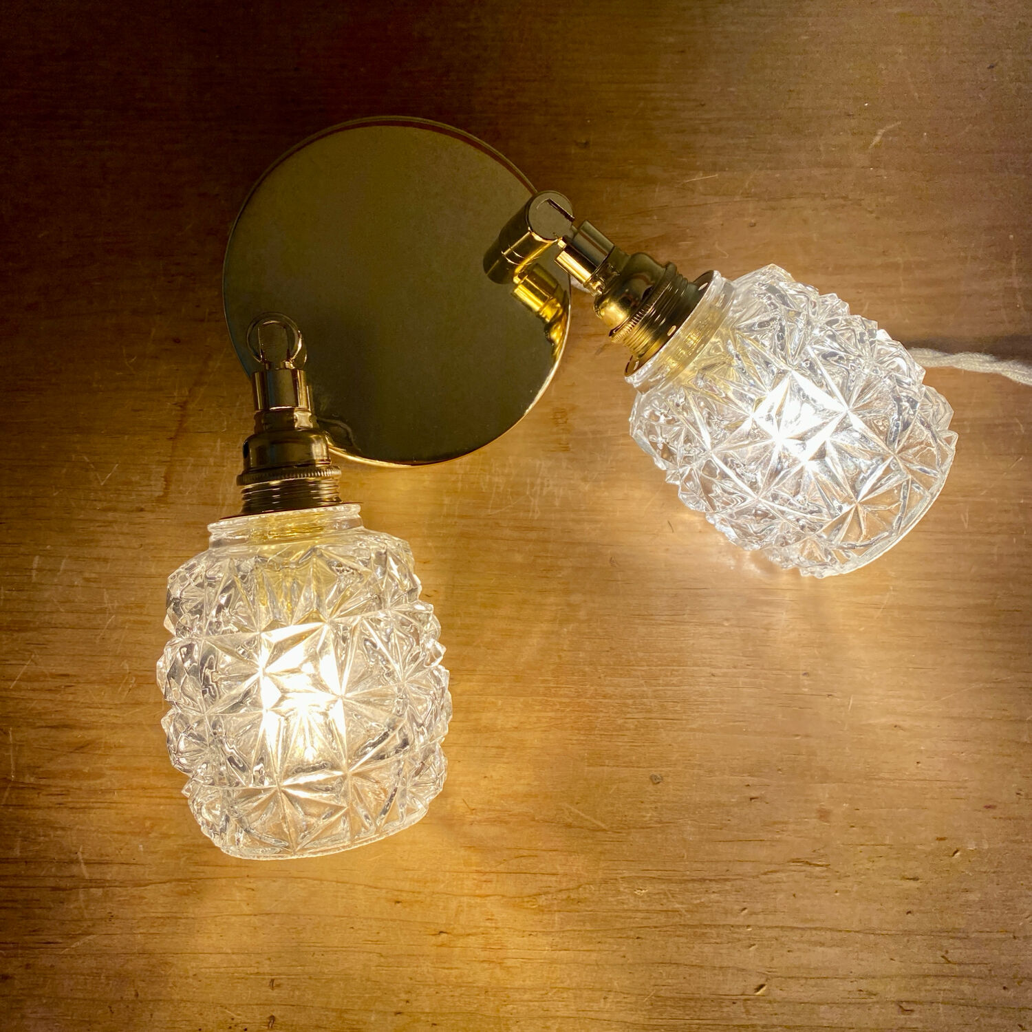 Double vintage tulip wall light in moulded glass.