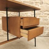 Modernist desk with suspended drawer unit, French work from the 1950s.